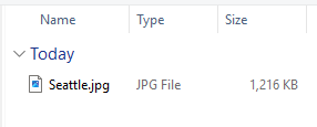 File explorer showing Seattle.jpg as a JPG file at 1,216 KB before upload.